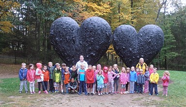 Group of Afterschool children and teachers at a local museum
